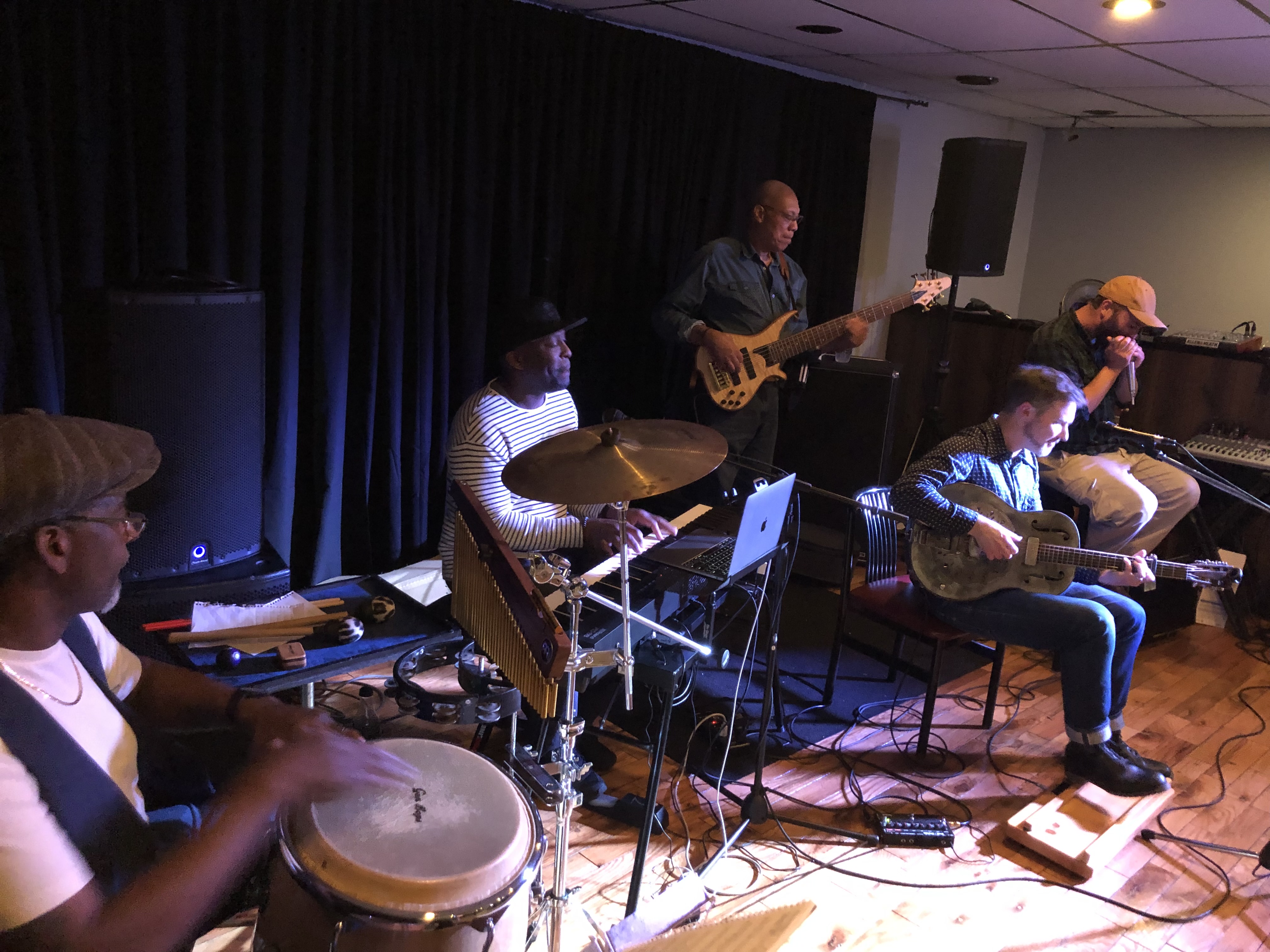 Full band performance showcasing musical versatility